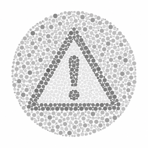 A grayscale picture of a warning sign in dots arranged in a circle appearing reminiscent of a colorblindness test.